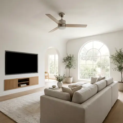 Sunny family room with an arched window, a ceiling fan and a media wall